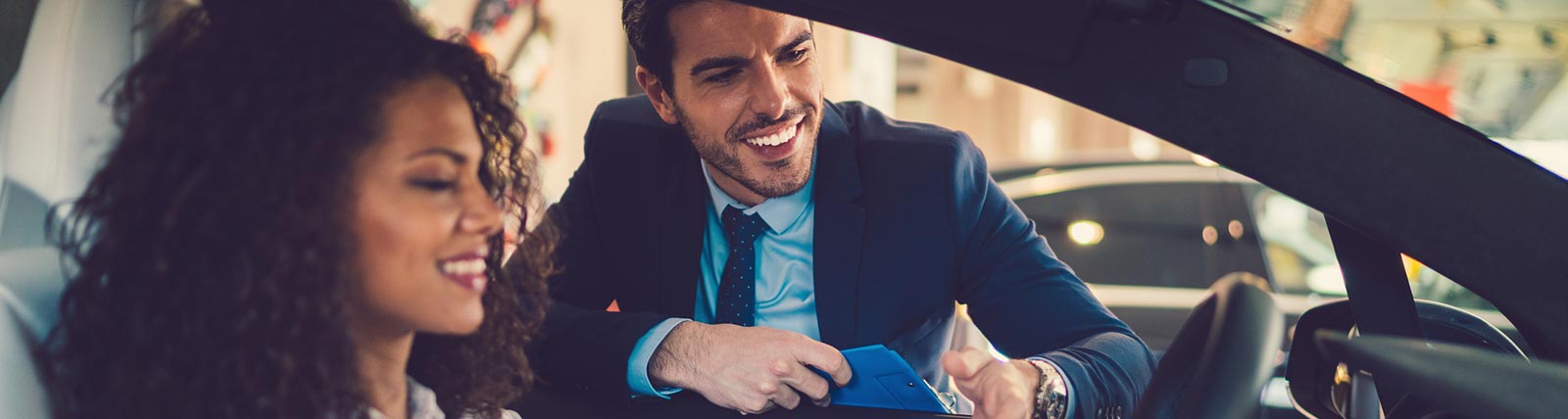 Woman buying new car