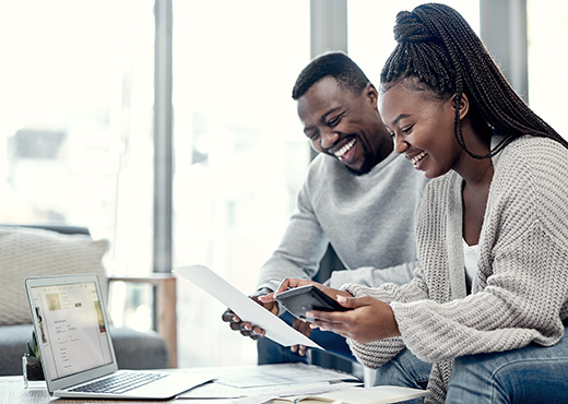 Young couple going over finances at home