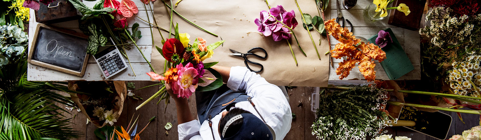aerial shot of person arranging flowers