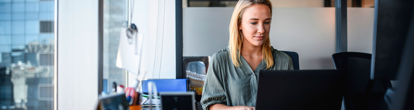 Female business owner working in office